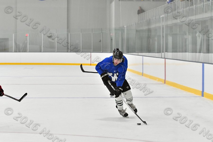 Wheaton College Men\'s Ice Hockey vs Middlesex Community College. - Photo By: KEITH NORDSTROM